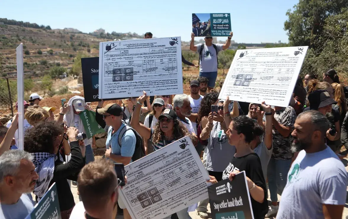 Palestinian residents demonstrating against the confiscation of land in the Al-Makhrour valley near Bethlehem